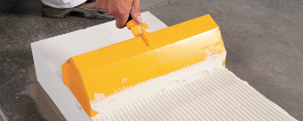 PORTAEDILE cazzuola dentata per blocchi in cellulare